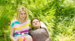 Portrait of a young couple lying on the grass