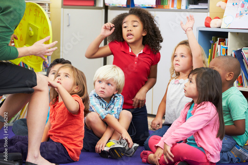 Photo: Elementary Pupils In Classroom Learning To Tell The Time Elementary Pupils In Classroom Learning To Tell The Time
