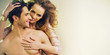 Young beautiful woman playing her boyfriend's hair