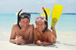 happy young couple have fun on beach