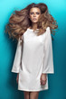 Photo: Blond beauty wearing white dress Blond beauty wearing white dress