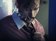 Smoking serious man after tiring job