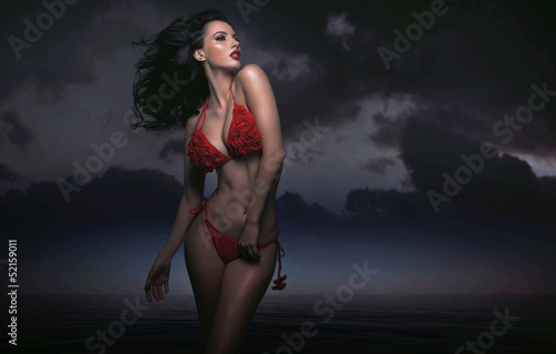 Photo: Sexy brunette in dark scenery Sexy brunette in dark scenery