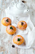 Muffins with powdered sugar and mint