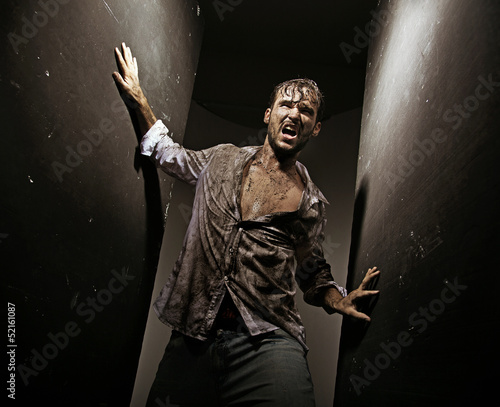 Photo: Wounded man after hard survival Wounded man after hard survival