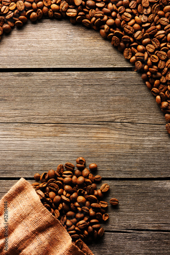 Photo: Coffee beans and bag background Coffee beans and bag background