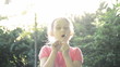 Video: girl blowing on a dandelion flower girl blowing on a dandelion flower