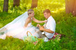 couple picnic sunlight wedding in forest glade, bride groom flow