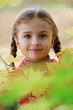 Spring, child - lovely girl enjoying spring in the park