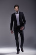 Photo: Elegant young model wearing suit Elegant young model wearing suit