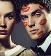 Handsome man with kiss-signs on the face