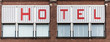 Sign HOTEL drawn on a wall
