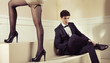 Photo: Glad man looking at shapely legs of his girlfriend Glad man looking at shapely legs of his girlfriend