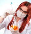 Photo: Chemist woman with test tubes Chemist woman with test tubes