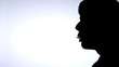 Silhouette of smoking man on white background