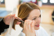 Closeup of hairdresser cutting hair