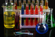 Photo: Colorful test tubes on dark background Colorful test tubes on dark background