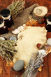 Composition with old papers, herbs, stones and bottles with