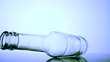 Empty glass bottle spinning