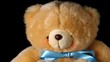Teddy bear falling on black background close up