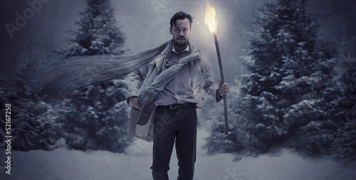 Photo: Handsome stylish guy wholding torch Handsome stylish guy wholding torch