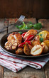 Foto: Oven-baked chicken with vegetables and herbs Oven-baked chicken with vegetables and herbs