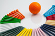 The colorful wooden golf tees