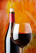 bottle and glass of red wine