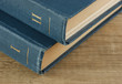 Old books on a wooden shelf