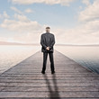 Foto: businessman looking at the sea businessman looking at the sea