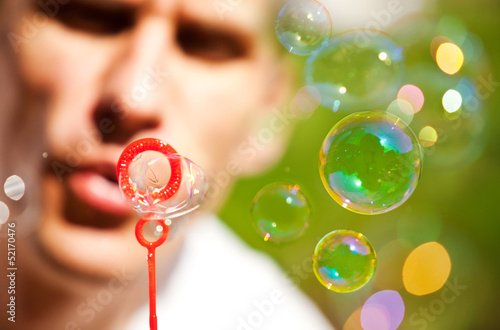Photo: Blowing bubbles outdoor Blowing bubbles outdoor