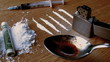 Video: Rolled up note falling on white substance with lines lighter syringe and cooking spoon Rolled up note falling on white substance with lines lighter syringe and cooking spoon