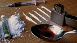Video: Rolled up note falling on white substance with lines lighter syringe and cooking spoon Rolled up note falling on white substance with lines lighter syringe and cooking spoon