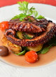 Fresh grilled octopus with olives, potato, tomatoes