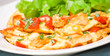 omelette with slices of chicken breast and vegetables