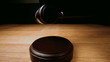 Gavel falling onto sounding block