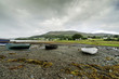 rowing boats on a sea shore