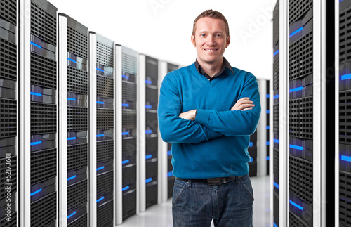 Photo: man in datacenter man in datacenter