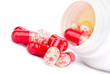 Red pills an pill bottle
