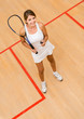 Woman playing squash
