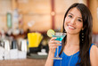 Foto: Woman having a drink Woman having a drink