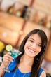 Woman drinking a martini