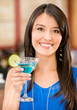 Woman drinking a cocktail