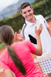 Happy tennis trainer