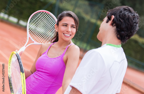 Photo: Couple of tennis players Couple of tennis players