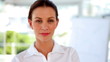 Video: Businesswoman walking into focus Businesswoman walking into focus