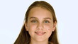 Girl smiling against white background