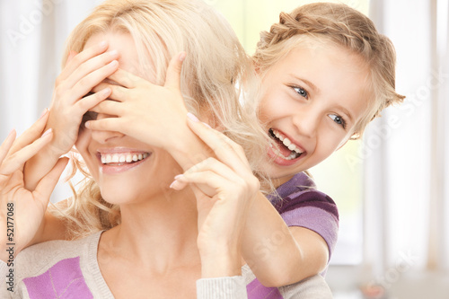 Photo: happy mother and little girl happy mother and little girl