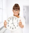 Photo: businesswoman with wall clock businesswoman with wall clock