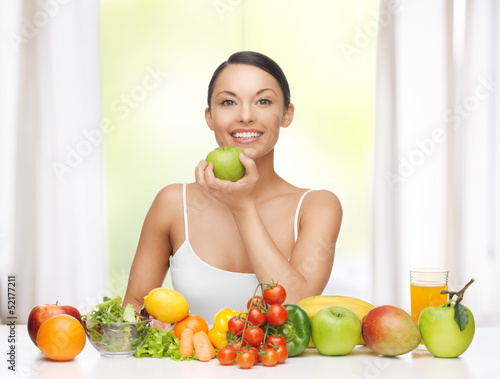 Photo: woman with fruits and vegetables woman with fruits and vegetables